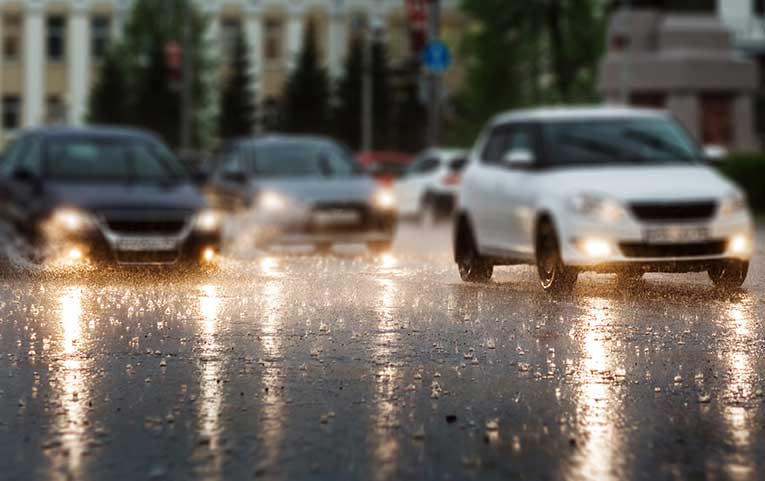 Driving in the rain on a wet road