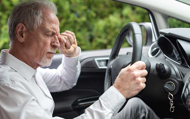 If you're experiencing symptoms of driver fatigue, pull over when it's safe and take a break.