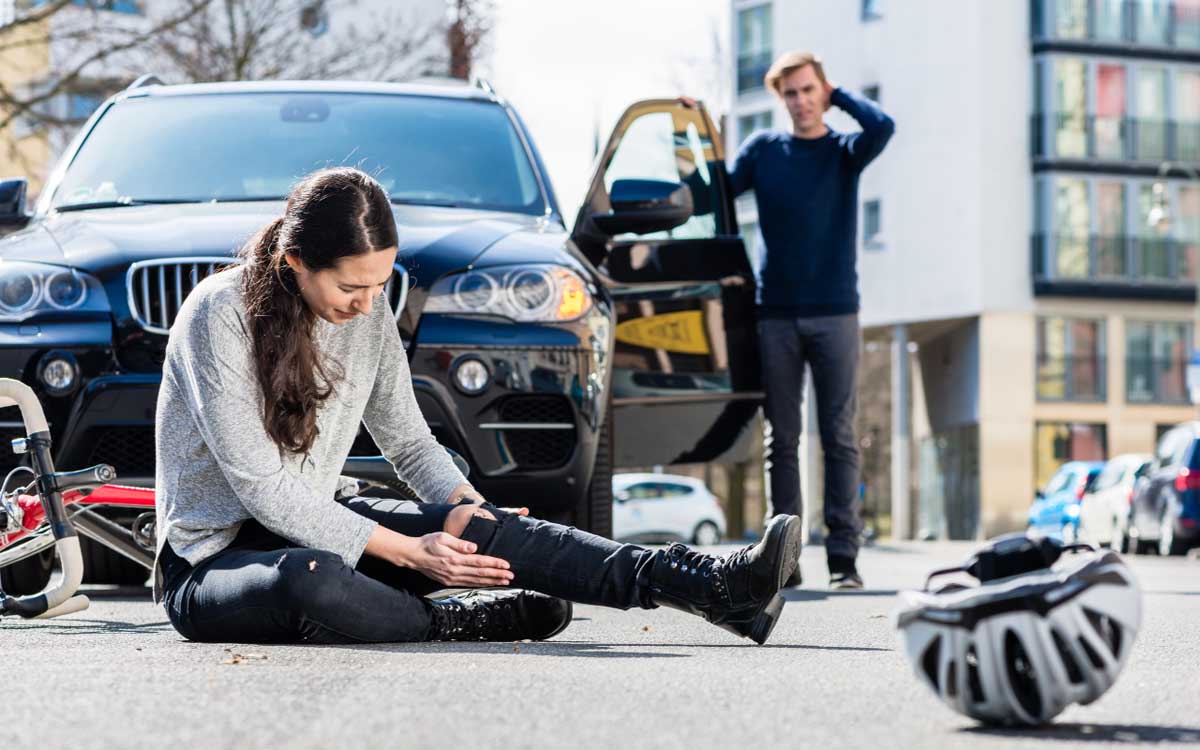 Lady cyclist hit by car