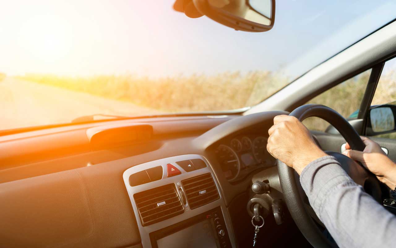 A Person Driving Using a Right Hand Drive Car