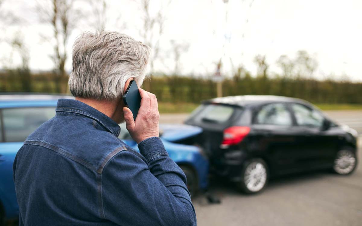 man calling after a two car accident