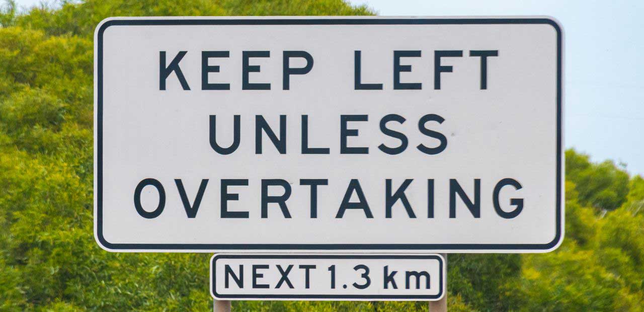 A Road Sign Saying Keep Left Unless Overertaking